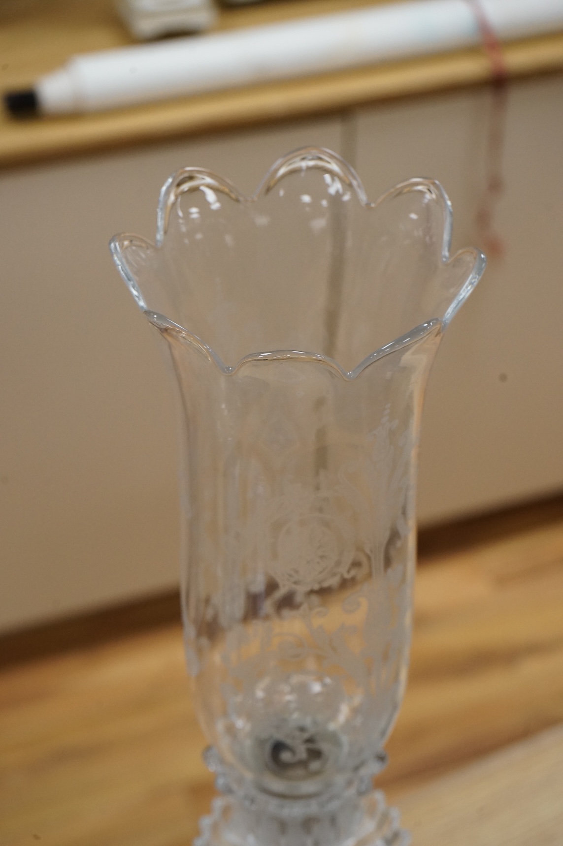 A Baccarat lustre drop figural glass candlestick, 62cm